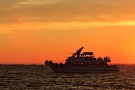 a sunset over a body of water