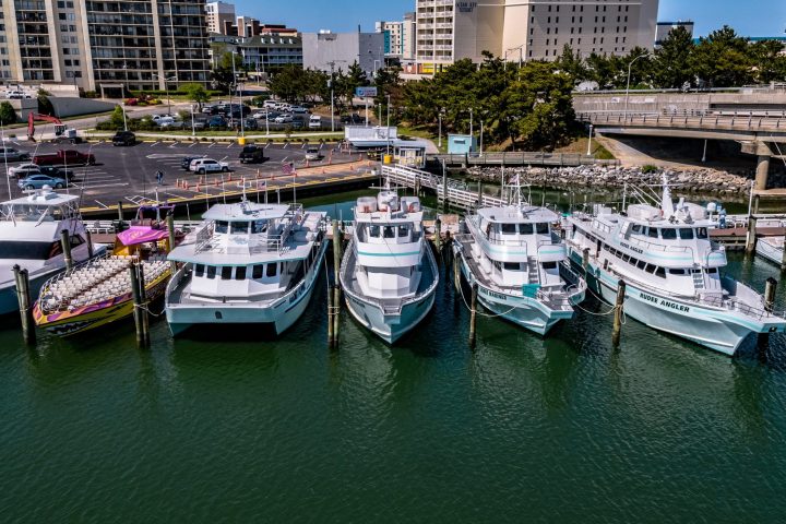 a boat is docked next to a body of water