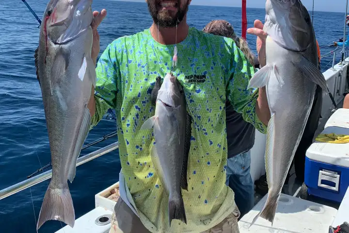 a person holding a fish