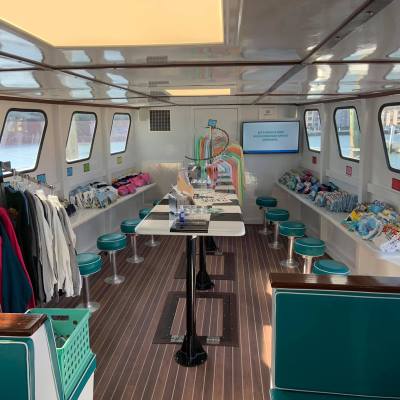 a room filled with furniture and a large window