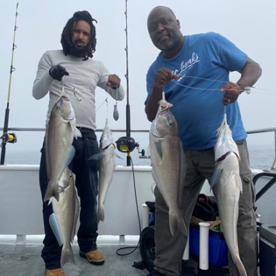 a man holding a fish