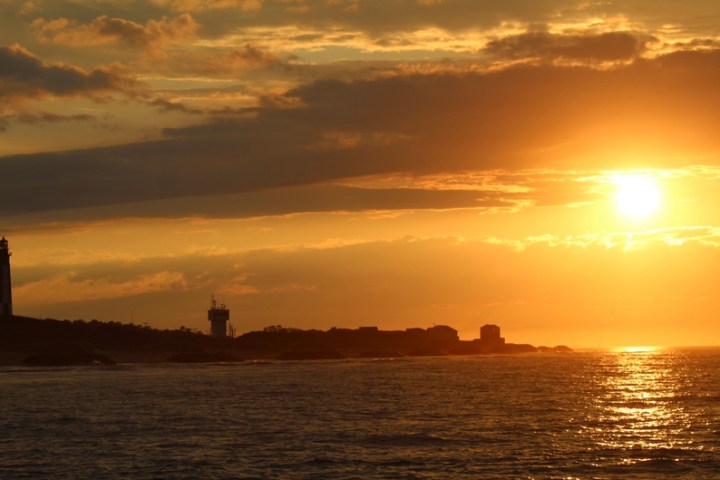 a sunset over a body of water